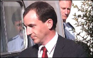 Scott Watson leaving a depositions hearing in 1998. A secret witness says statements he made about Watson were not true.